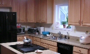 The same kitchen after restoration. Project by Mayer Builders.
